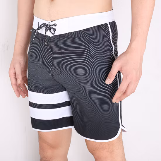 Pantalones cortos transpirables de secado rápido para requisitos particulares del tablero de la nadada de la playa al por mayor del poliéster del estiramiento para los hombres